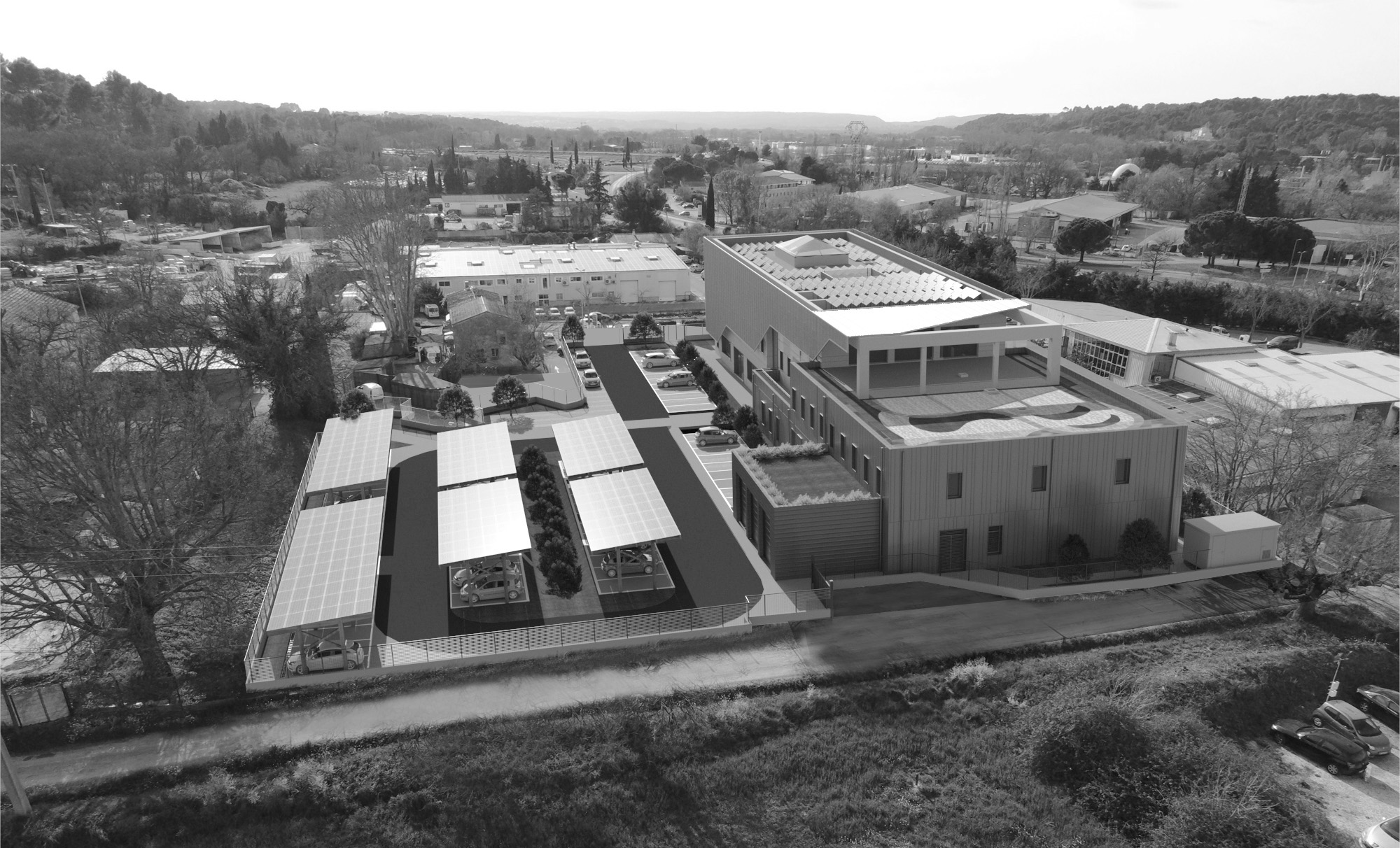 Construction bureaux et ateliers. Toitures végétalisées, photovoltaïques, bornes IRVE. Réaménagement du parking à Aix en Provence avec 3i